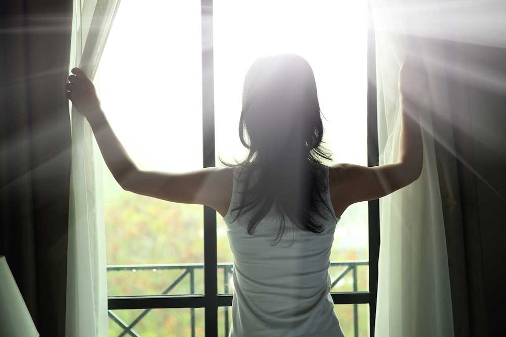 Girl Looking through Windows