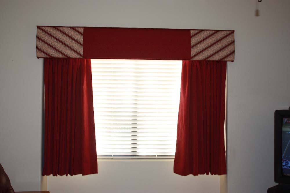 Custom Cornice with Contrast Fabric and Welts over Drapery Panels